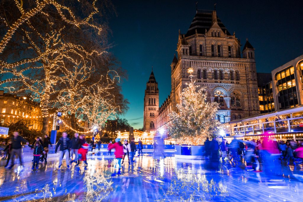 People Ice Skating, Natural History Museum in Kensington, London, UK