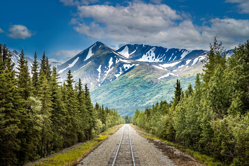 Railroad to Denali National Park, Alaska with impressive mountains - Accent on Travel