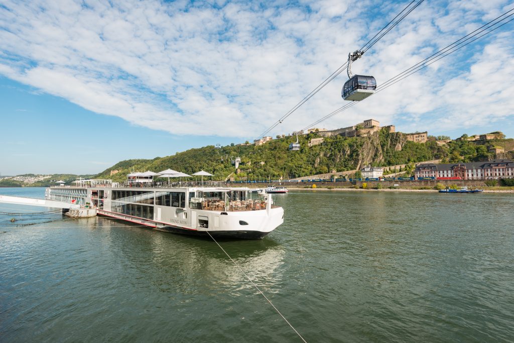 Viking Longship Hlin docked in the Upper Middle Rhine Valley in Koblenz, Germany with the Koblenz - Accent On Travel